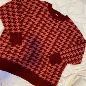 red and pink houndstooth sweater